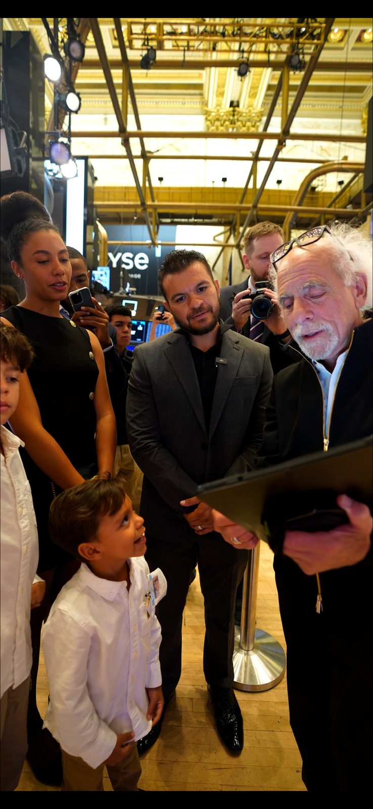 Andrew and his family at the New York Stock Exchange, watching the closing ceremony