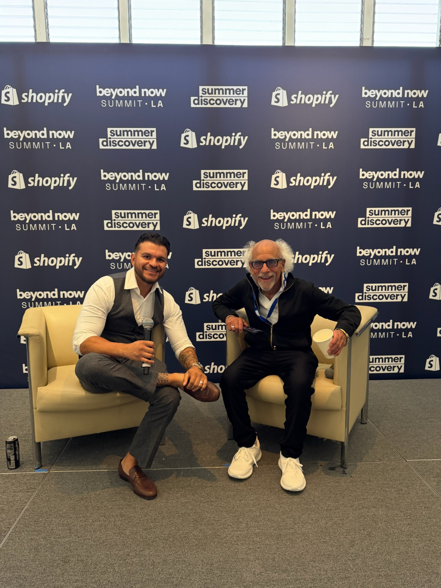Andrew Diaz on stage in a fireside chat at the Shopify Beyond Now Summit in Los Angeles